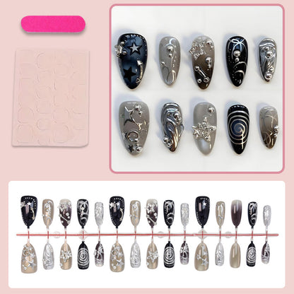 Kunstnageldesign Set mit glamourösen Sternen- und Metallic-Akzenten Brehn