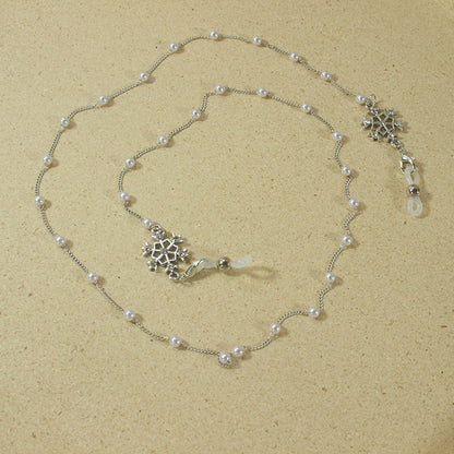 Elegante Brillenhalterkette mit Perlen und Schneeflockenanhänger Brehn