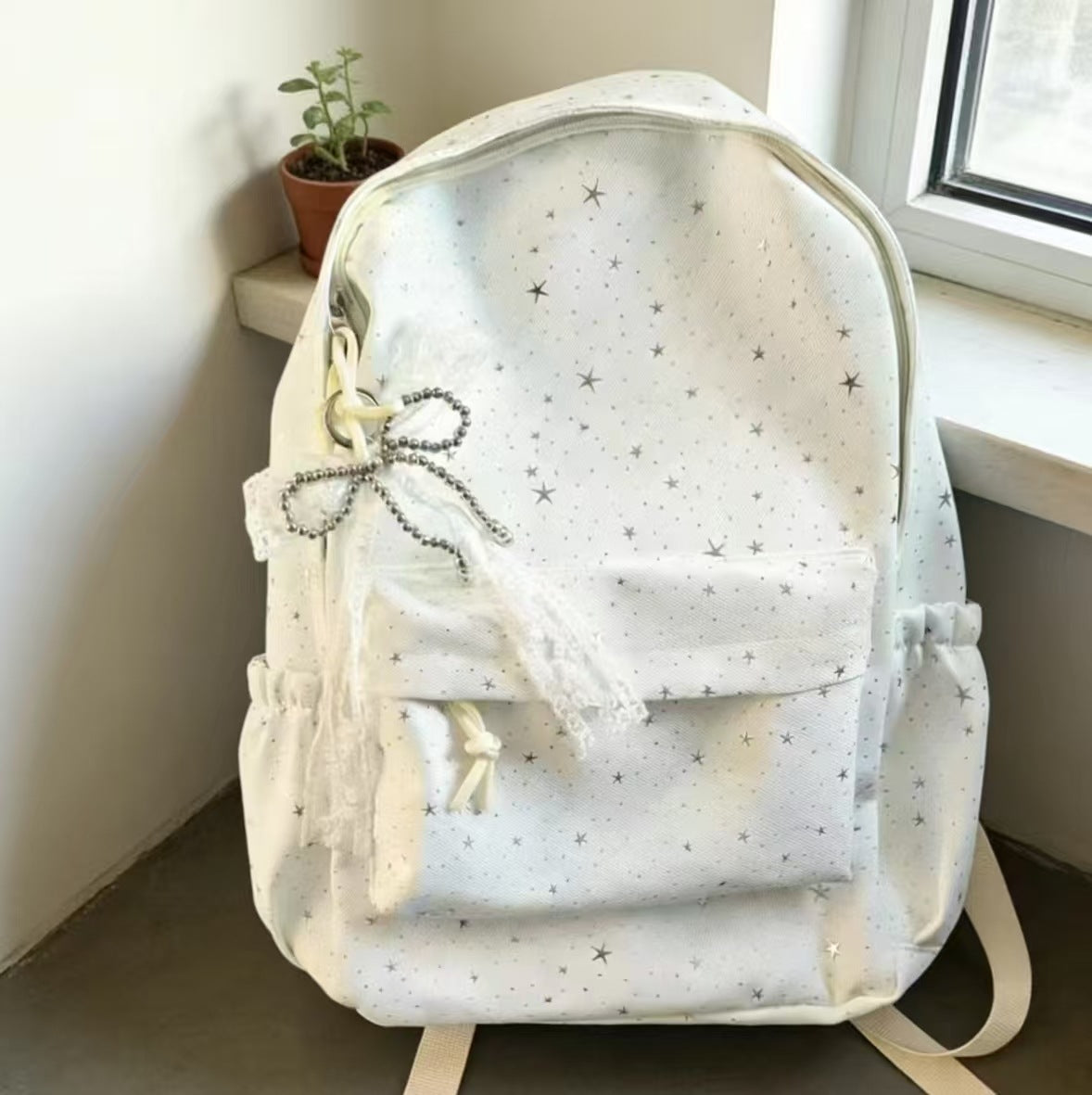 Verspielt mit Sternen verzierten Rucksack Brehn