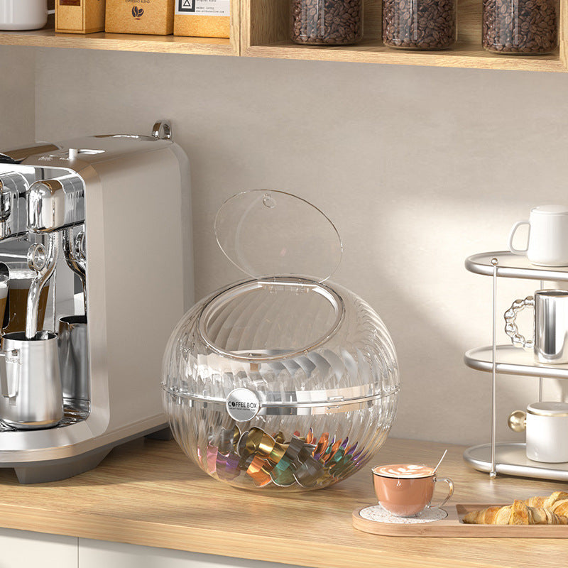 Kugelförmiger Kaffeekapselspender aus klarem Acryl mit Klappdeckel