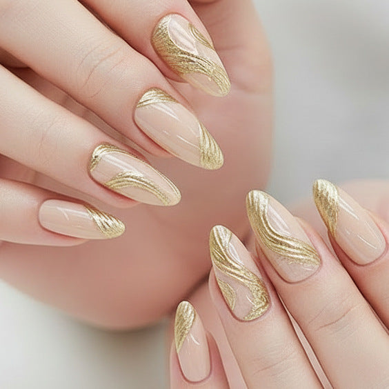Künstlerisches Press-On Nagelset mit goldener Wirbel-Design Brehn