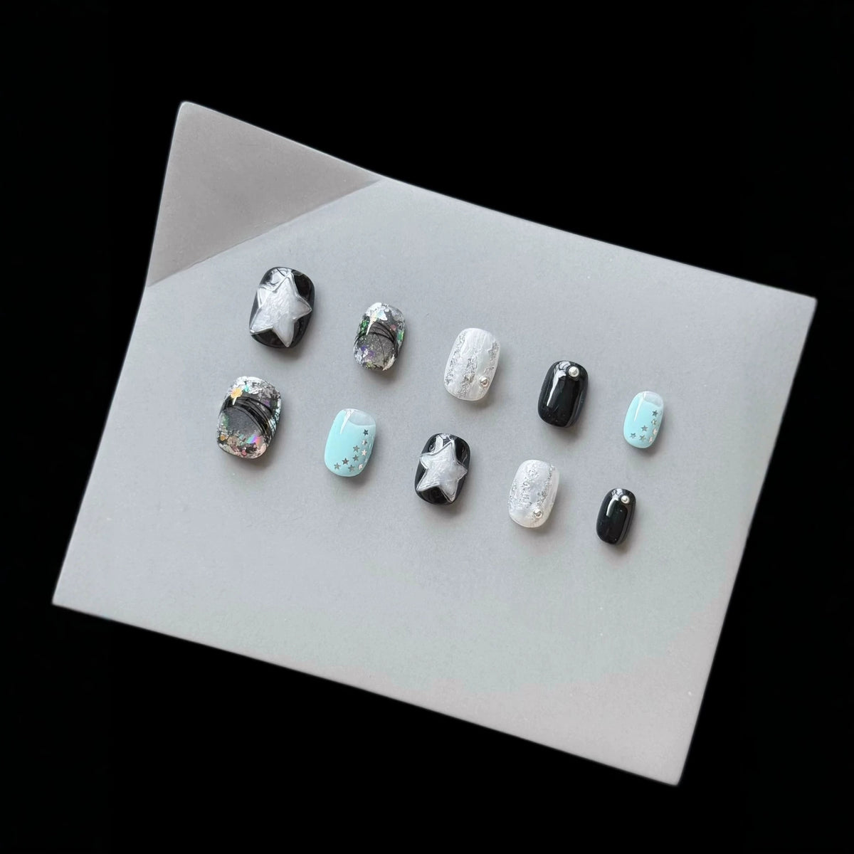 Dekoratives Press-On Nagelkunst-Set mit kosmischem Stern-Thema