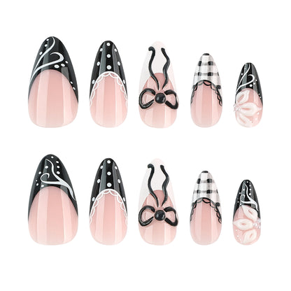 Kunstvolle Stiletto-Nägel mit floralen und geometrischen Akzenten Brehn