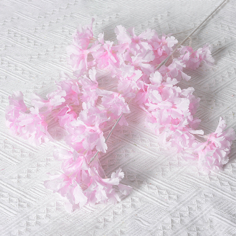 Elegante falsche Blumenranken Dekoration