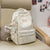 Lustiger gemusterter Schulrucksack