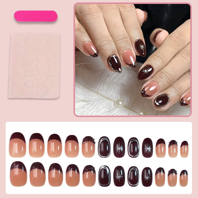 Kunstnagelset mit eleganten Farbverlauf und zarten Verzierungen Brehn