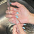 Dekoratives Press-On-Nagelkunst-Set mit charmantem Schleifen-Design Brehn