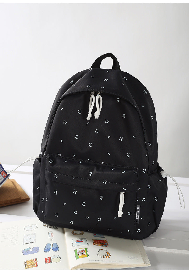 Blumengemusterter leichter Schulrucksack