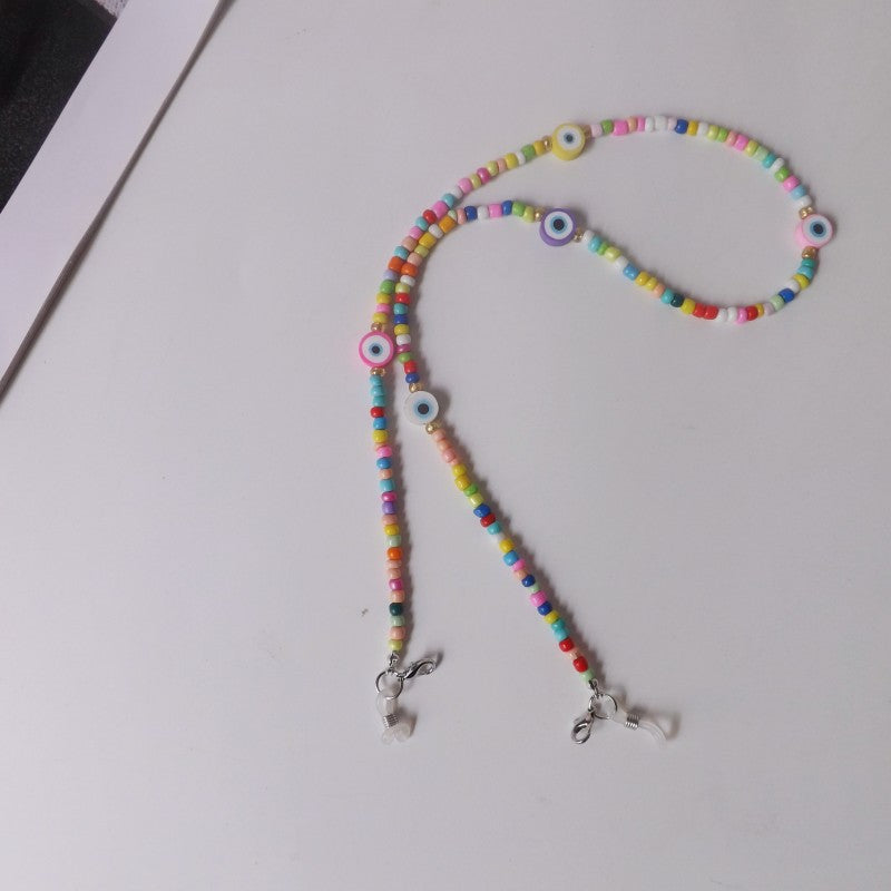 Bunte Brillenhalterkette mit Augenmotiven Brehn