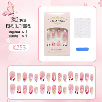 Kunstnagelset mit floralen und glamourösen Dekoren Brehn