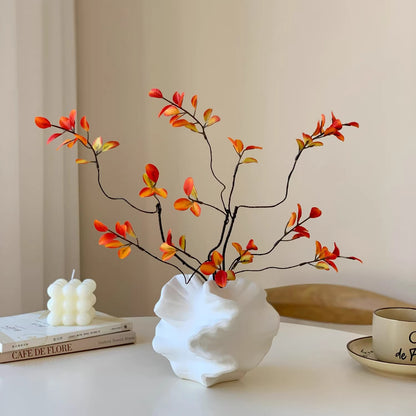 Dekorative florale Zweigarrangement für die Wohnkultur