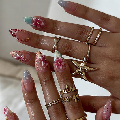 Kunstnagel-Set mit floralen und glitzernden Akzenten Brehn