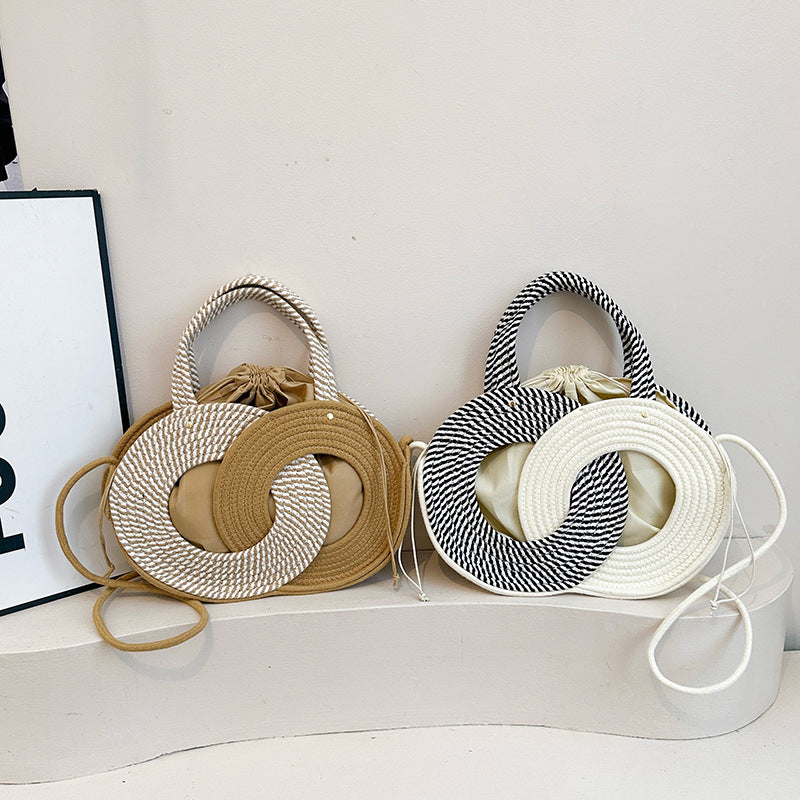 Künstlerische Doppelkreis-Griff-Tasche