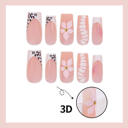 Elegantes Kunstnagelset mit floralen und tierischen Akzenten Brehn