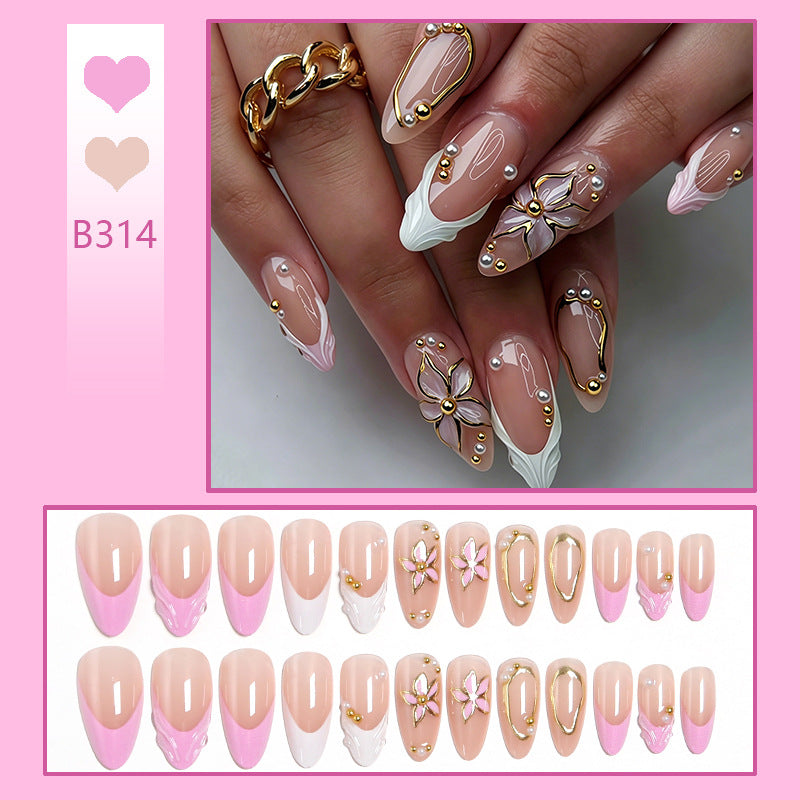 Kunstnagelset mit eleganten floralen Designs und Glamourösen 3D-Applikationen Brehn