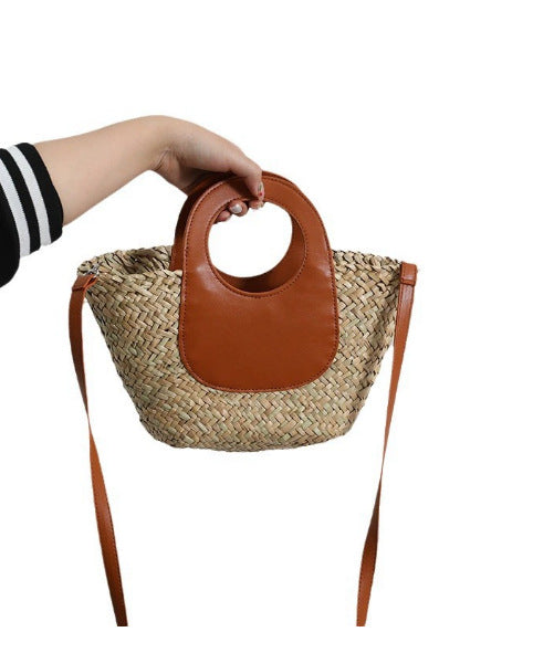 Damen Handtasche aus geflochtenem Material mit Lederdetails Brehn