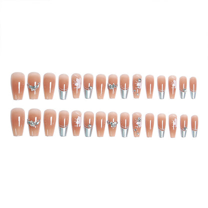Kunstnagelset mit glamourösen Blüten- und Glitzerverzierungen Brehn
