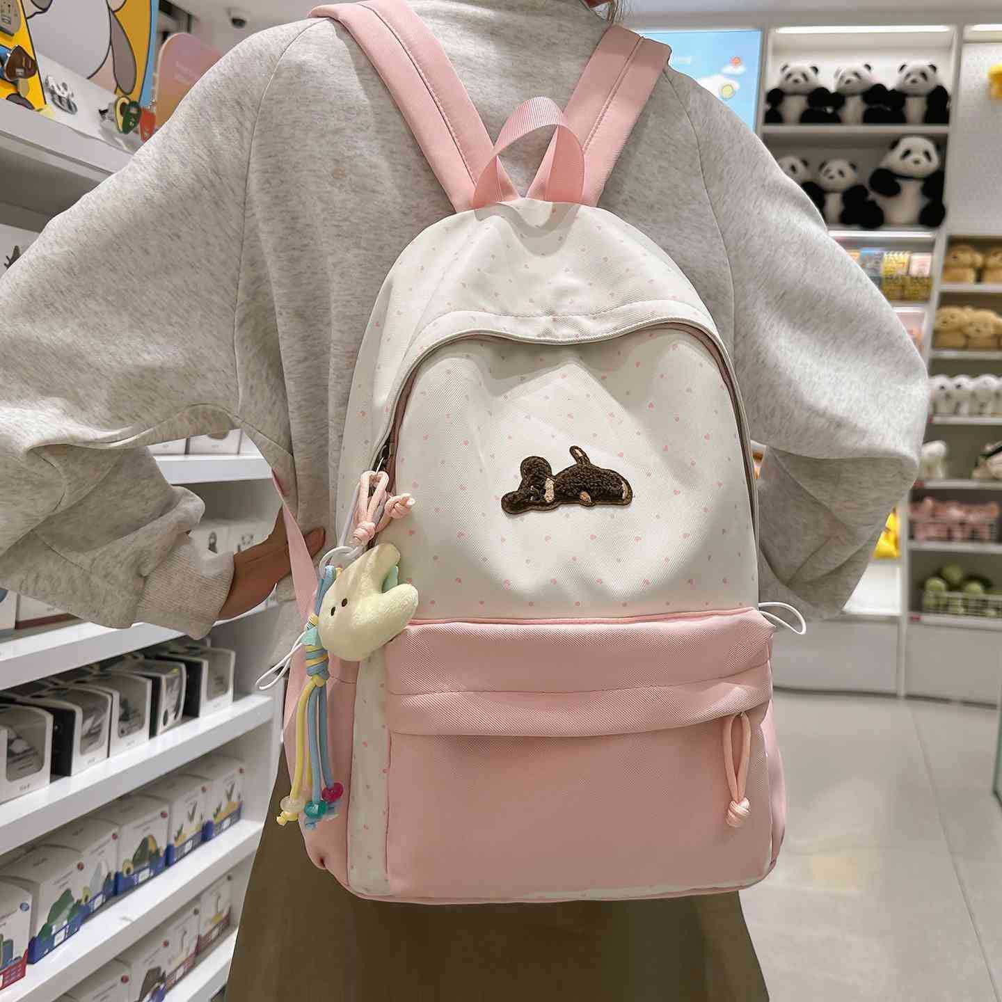 Verspielter gepunkteter animierter Rucksack Brehn