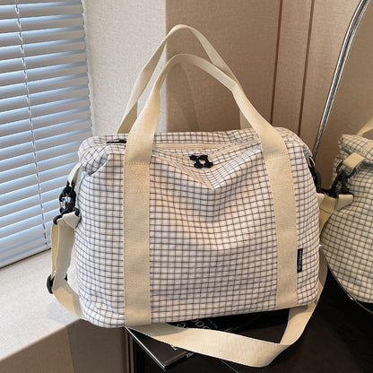 Gestreifter Reise-Duﬄe