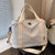 Gestreifter Reise-Duﬄe