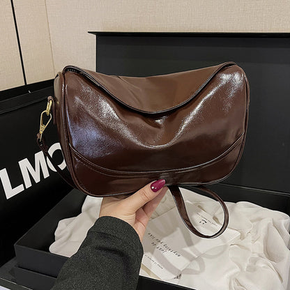 Sleek Pouch Umhängetasche