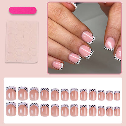 Kunstnagelset mit eleganten Punkten und hochglänzenden Akzenten Brehn