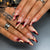 Künstlerisches Stiletto Press-On Nagelset mit tropfendem Design Brehn