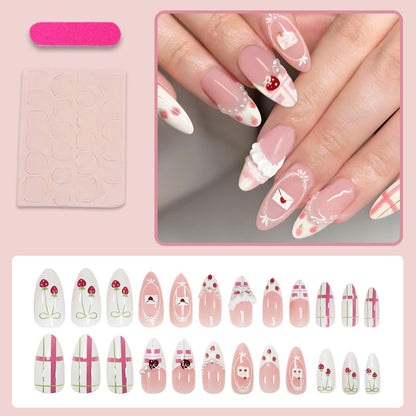 Kunstnagelset mit verspielten Blüten- und aufwendigen Dekoren Brehn