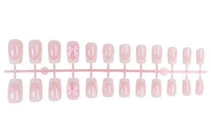 Kunstnagelset mit romantischen Schleifen und eleganten Akzenten Brehn