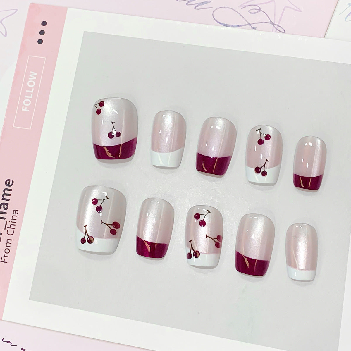 Kunstvolle Nagelspitzen mit Kirsch-Design Brehn