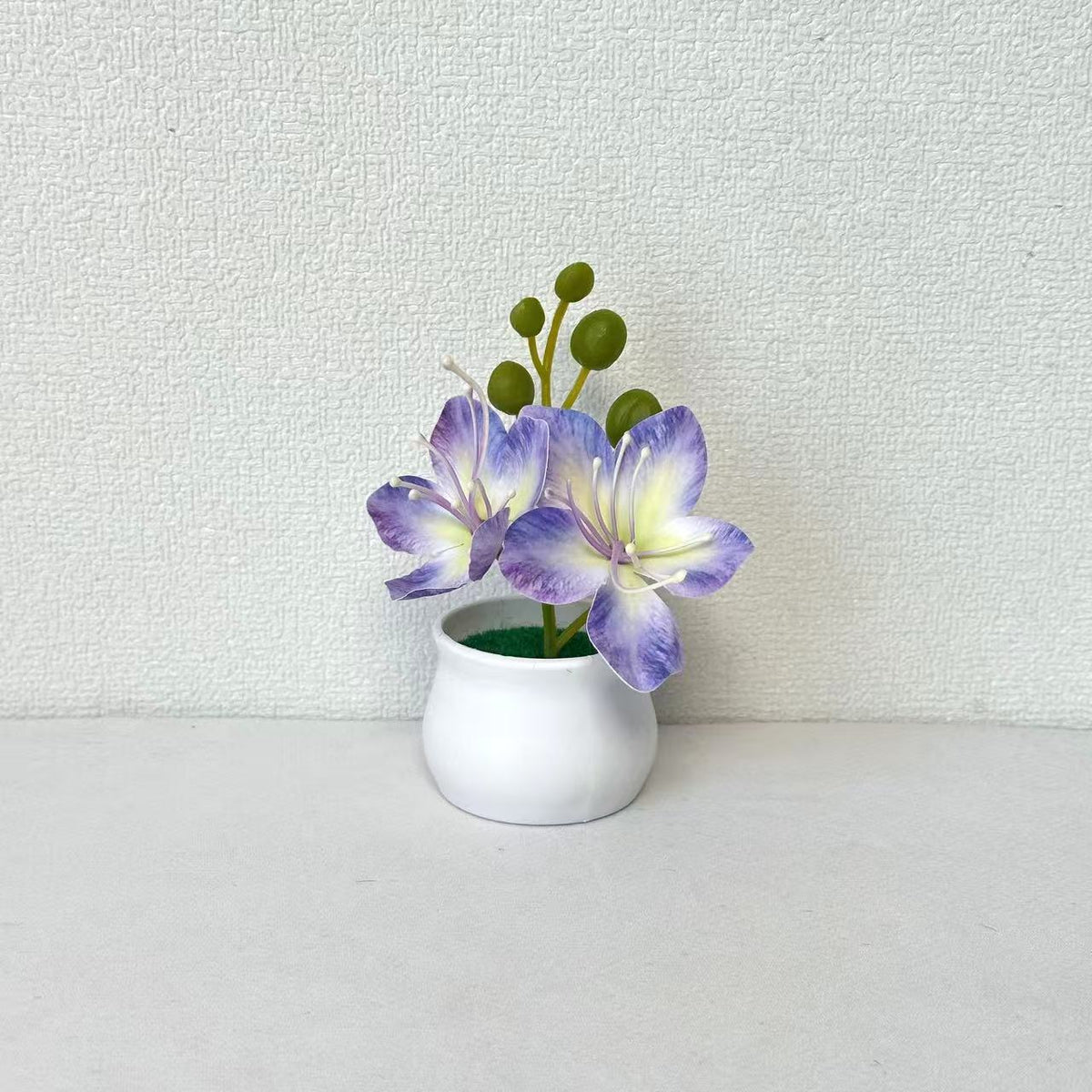 Elegantes Miniatur-Blumengesteck