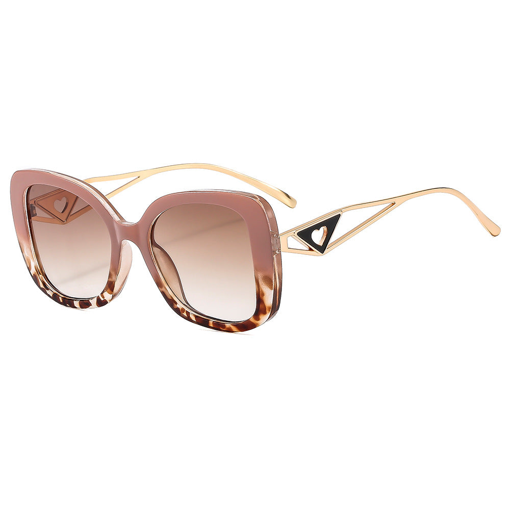 Damen modische oversized Sonnenbrille mit luxuriösem Herzdetail Brehn