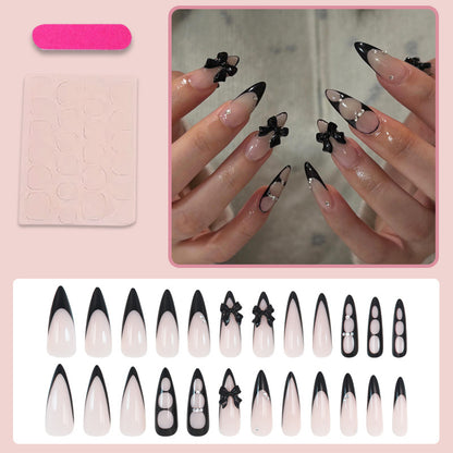 Kunstnagelset mit schimmernden Akzenten und eleganten Schleifen Brehn