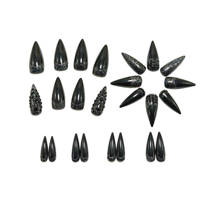 Kunstnägel im eleganten Stiletto-Design mit funkelnden Strass-Applikationen Brehn