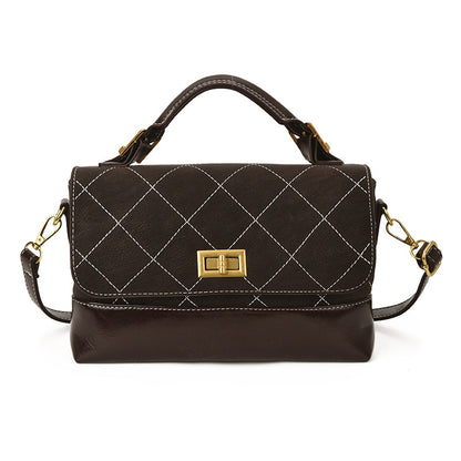Gep quiltete Wildleder- und glänzende Leder-Handtasche