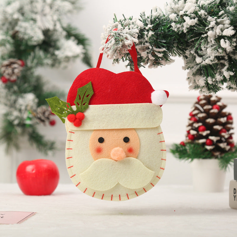 Niedlicher Weihnachtsgnom mit Geschenkesack Brehn