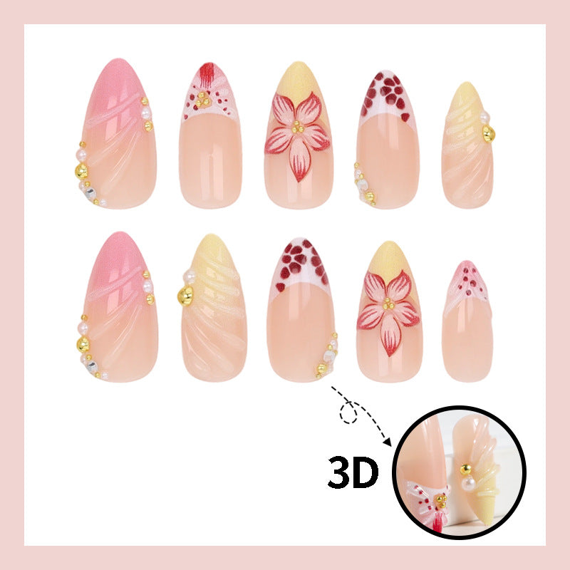 Kunstnagelset mit kreativen floralem Design und glitzernden Akzenten Brehn