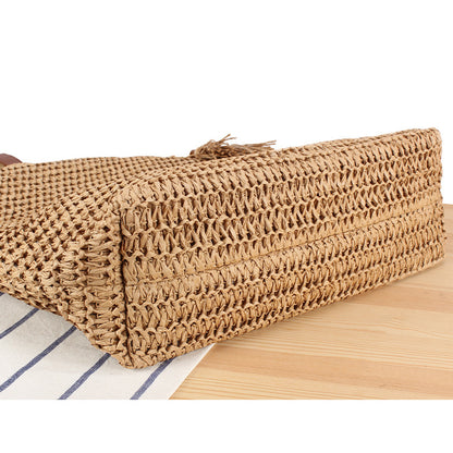 Handtasche Aus Geflochtenem Naturmaterial mit Quastenverzierung Brehn