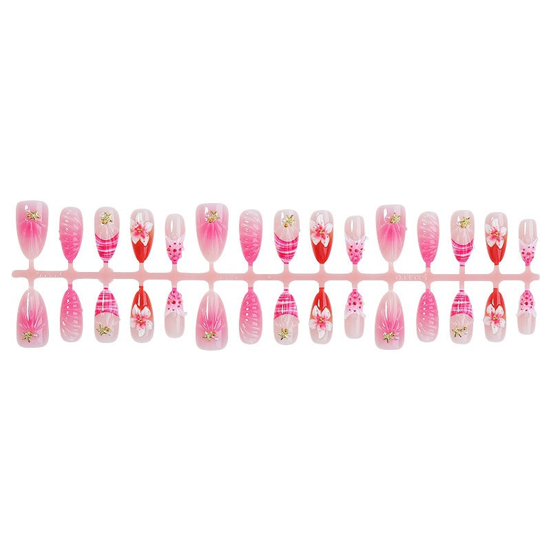 Kunstnagelset mit blühenden 3D-Details und Glitzerakzenten Brehn