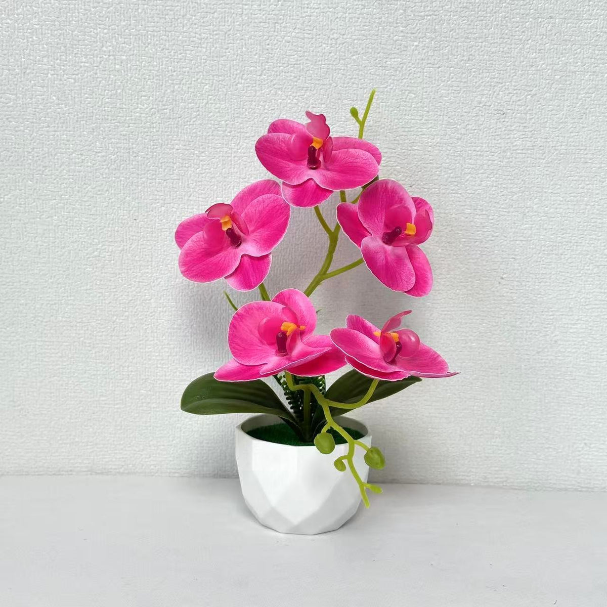 Künstliche Orchideenblumenarrangement für die Innendekoration