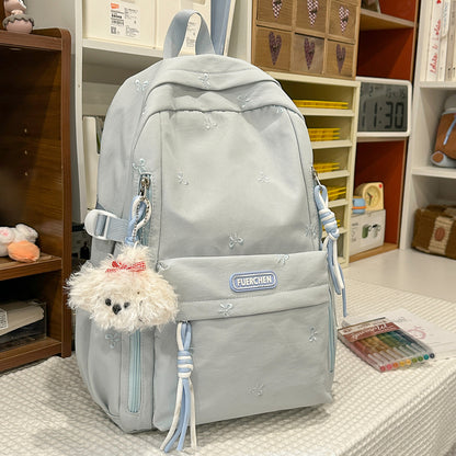 Stylischer Multi-Taschen Rucksack mit pelzigem Schlüsselanhänger Brehn