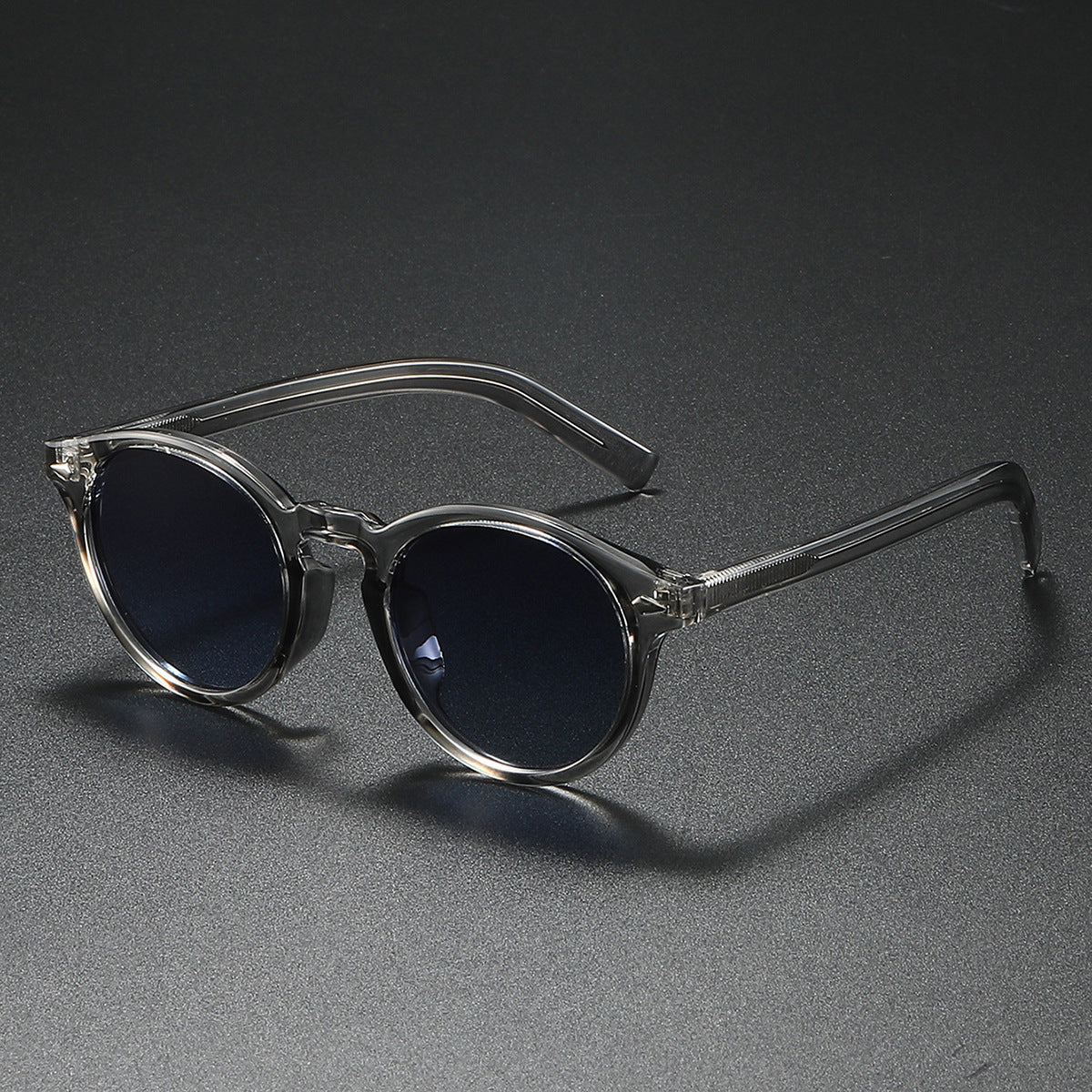 Damen Rund-Sonnenbrille mit transparentem Rahmen und reflektierenden Gläsern Brehn