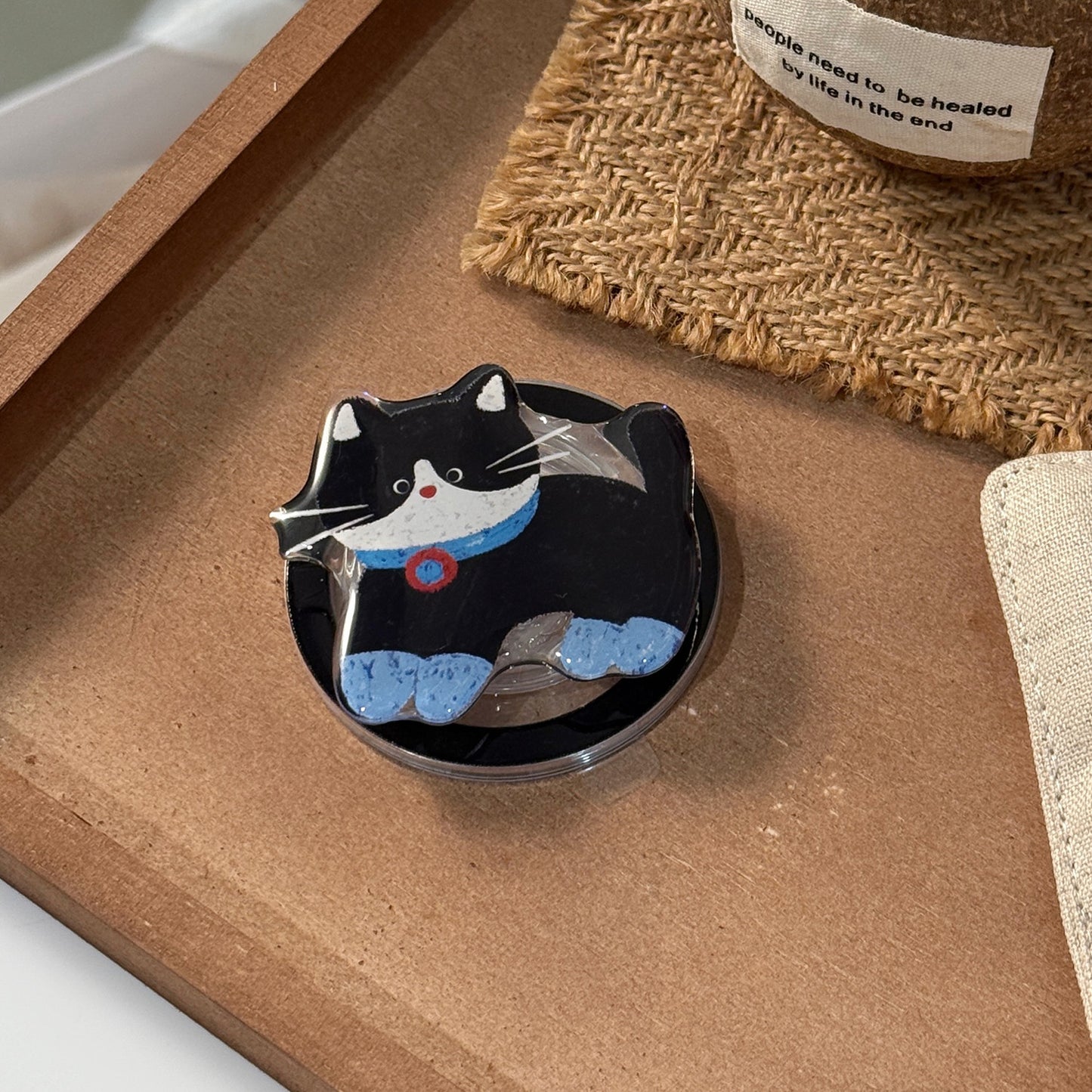 Verspielter Katzenmotiv Smartphone Fingerhalter Brehn
