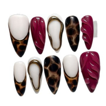 Dekorativer Stiletto Press-On Nagelset mit künstlerischen Mustern Brehn
