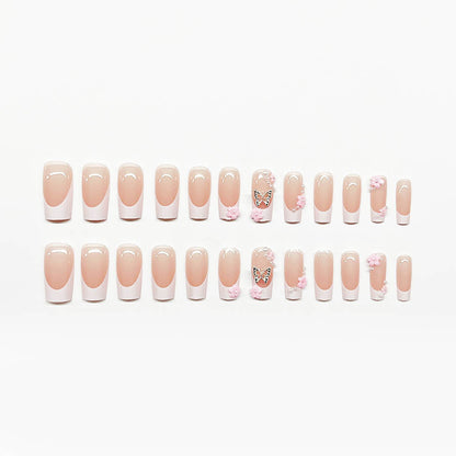 Kunstnagelset mit verspielten 3D-Blüten und Glitzerakzenten Brehn