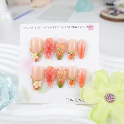 Kunstnagelset mit romantischen Blüten und fruchtigen Akzenten Brehn