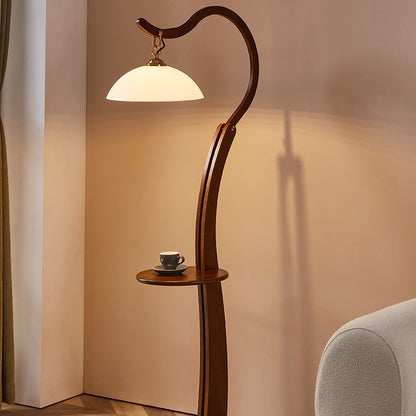 Künstlerische Stehlampe mit integriertem Beistelltisch