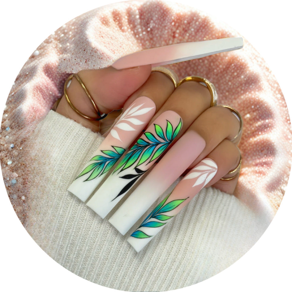 Kunstnägel mit elegantem Ombre-Design und floralen Akzenten Brehn