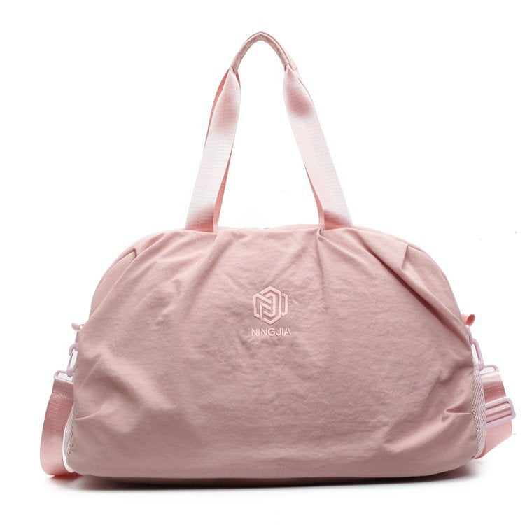 Kompakte Reis-Handtasche
