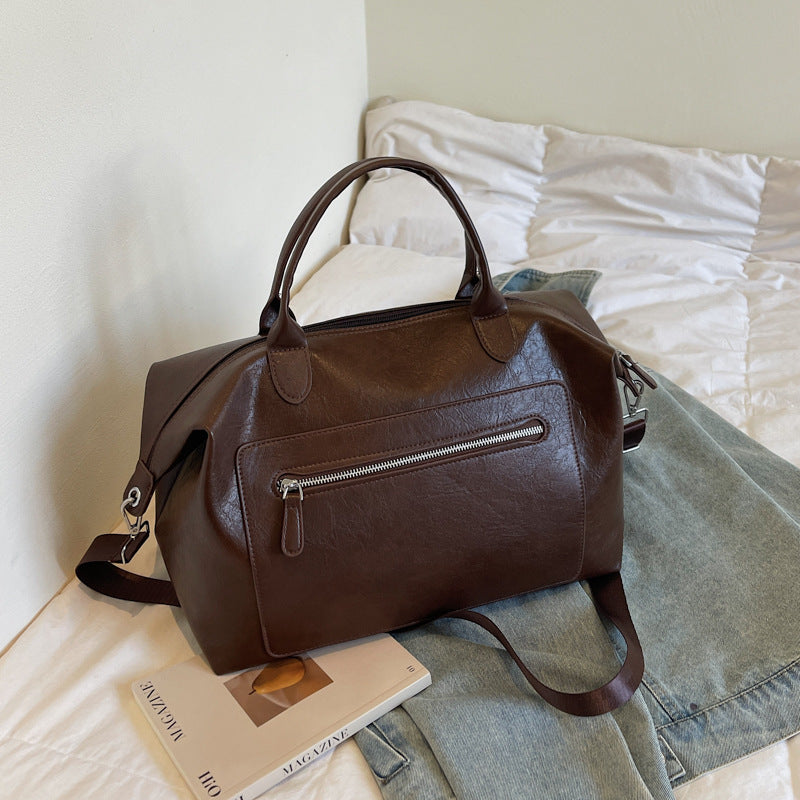 Multifunktionale stilvolle Reisehandtasche